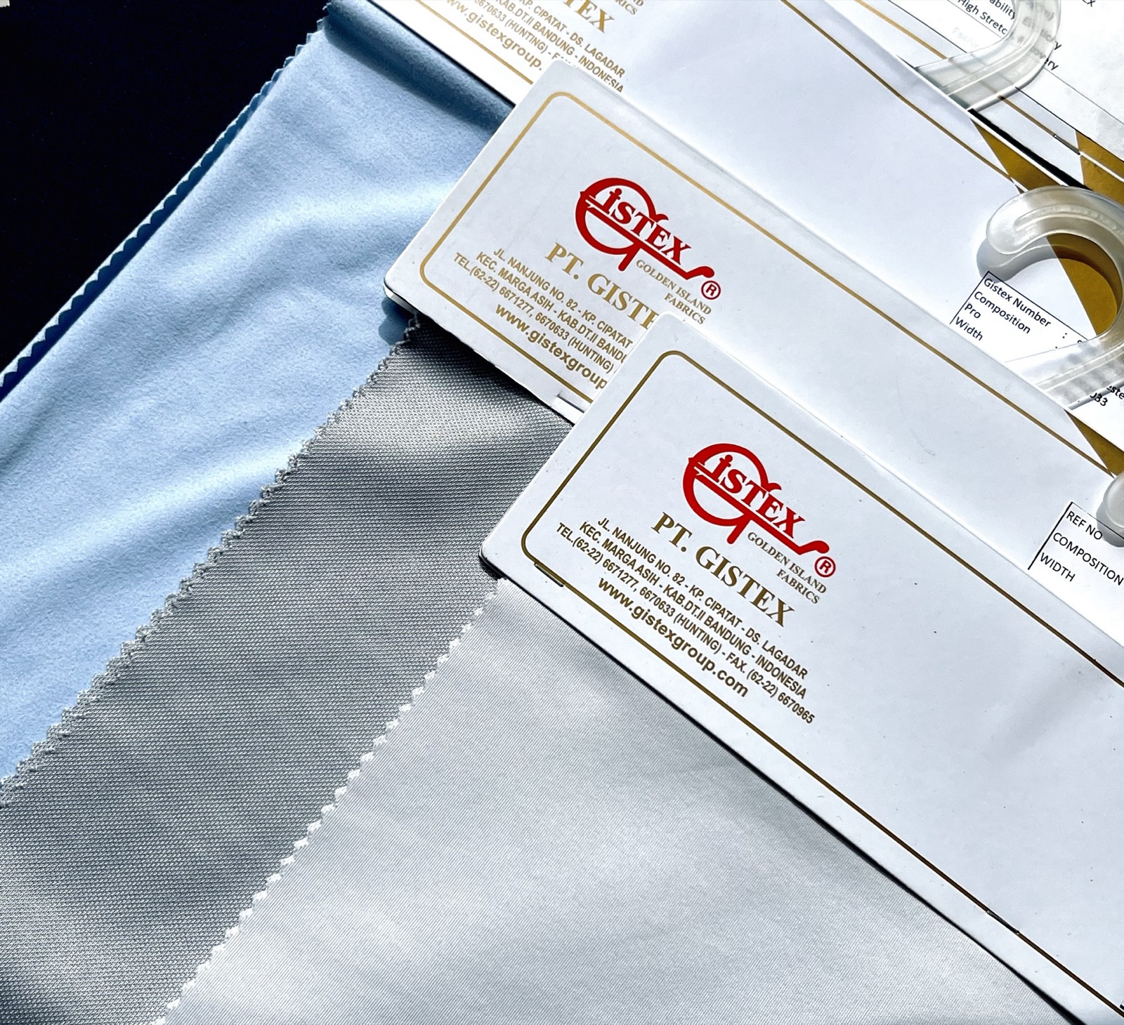 GISTEX satin fabric swatches with labels